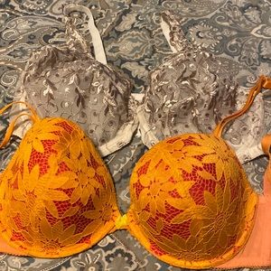 Two Bras both are 42D. Excellent to new condition
